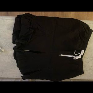 Cute linen shorts with ruffle hem.